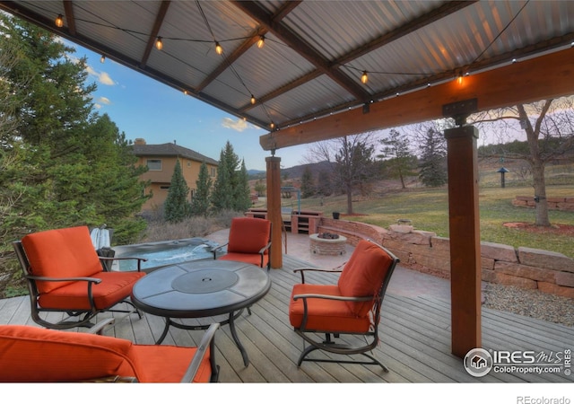 385 Vasquez Ct, Lyons, CO 80540 - wooden terrace featuring an outdoor fire pit