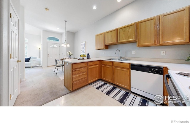 1839 Laurus Ln, Johnstown, CO 80534 - kitchen featuring white dishwasher, stove, recessed lighting, light countertops, and a peninsula