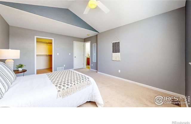 1839 Laurus Ln, Johnstown, CO 80534 - bedroom with light carpet, lofted ceiling, a ceiling fan, a spacious closet, and a closet