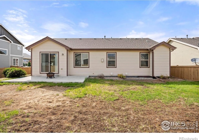 6818 Meadow Rain Way, Wellington, CO 80549 - rear view of house featuring a patio