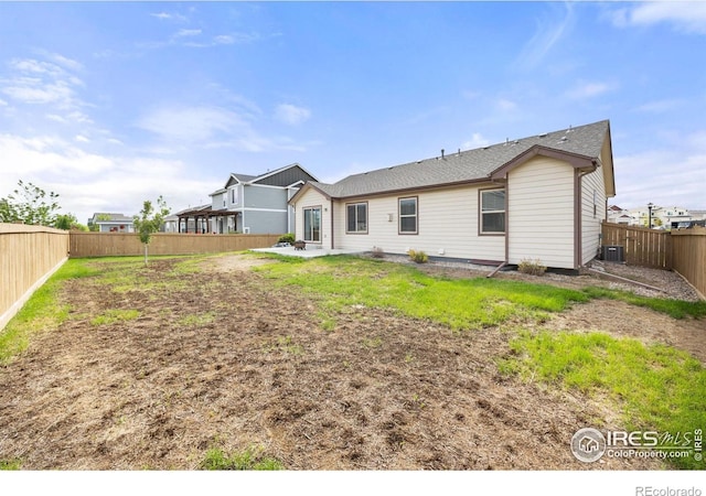 6818 Meadow Rain Way, Wellington, CO 80549 - back of property featuring a fenced backyard and a patio area