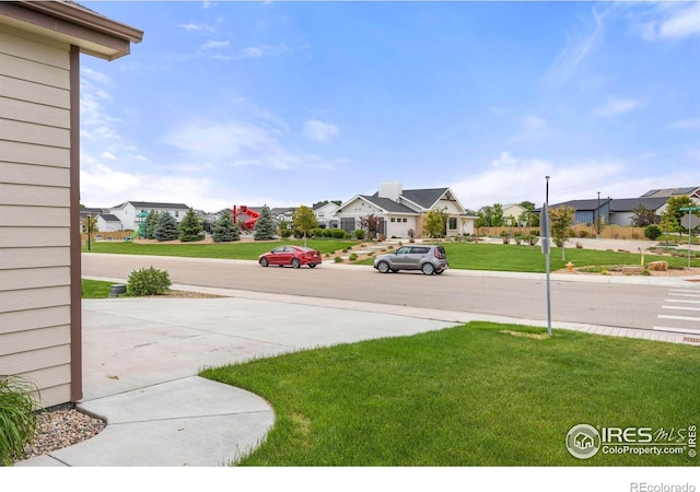 6818 Meadow Rain Way, Wellington, CO 80549 - view of grassy yard featuring a residential view
