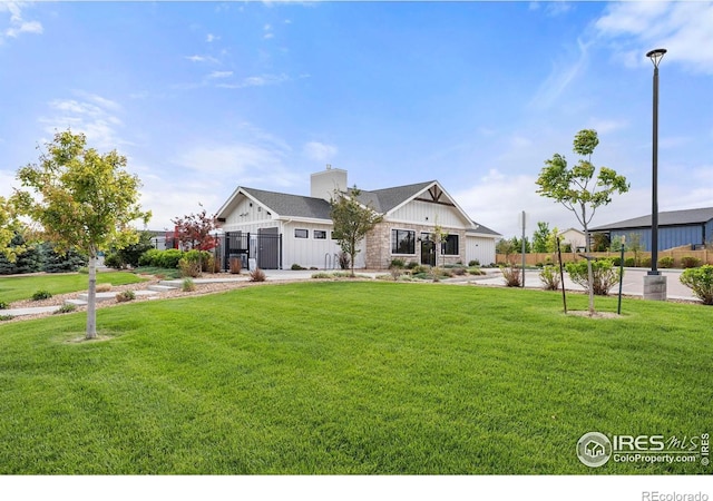 6818 Meadow Rain Way, Wellington, CO 80549 - view of front of home featuring board and batten siding and a chimney