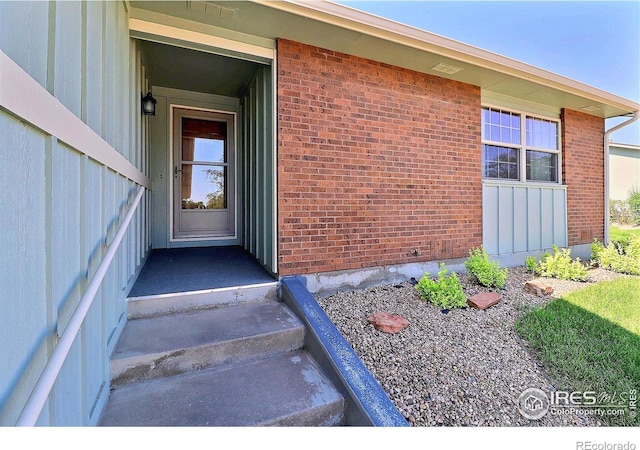 3405 W 16th St Unit 30, Greeley, CO 80634 - property entrance featuring brick siding