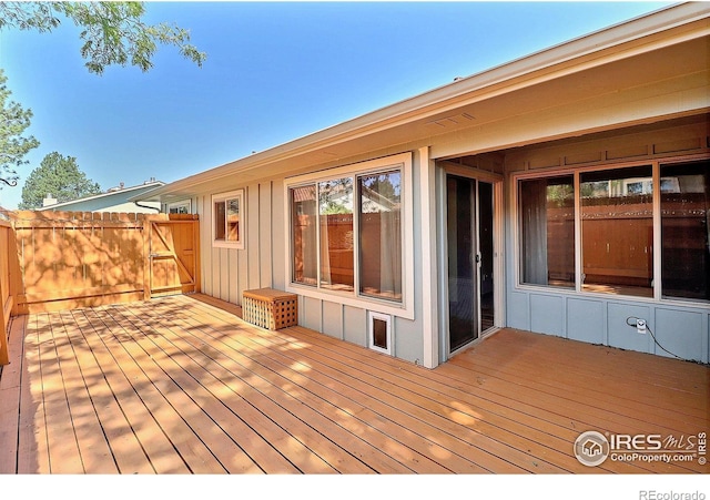 3405 W 16th St Unit 30, Greeley, CO 80634 - wooden terrace featuring a gate