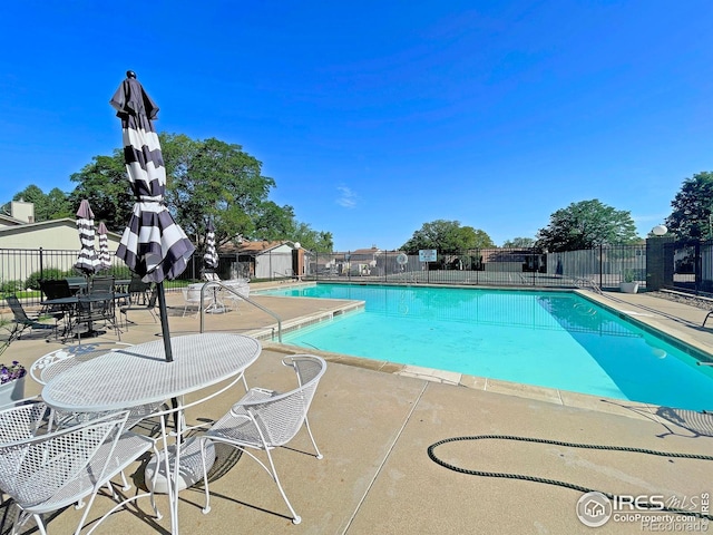 3405 W 16th St Unit 30, Greeley, CO 80634 - community pool featuring a patio area
