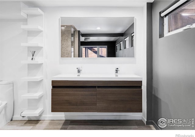 781 Cold Springs Rd, Nederland, CO 80466 - bathroom featuring double vanity and baseboards