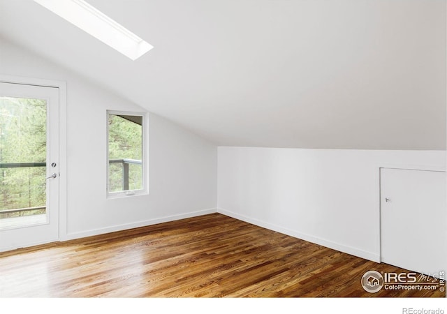 781 Cold Springs Rd, Nederland, CO 80466 - bonus room with lofted ceiling, a skylight, and wood finished floors