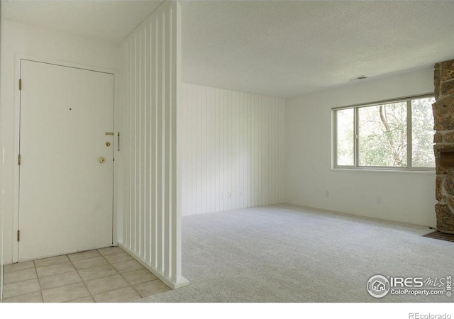3345 Chisholm Trl Unit 206, Boulder, CO 80301 - unfurnished room with carpet flooring and a textured ceiling
