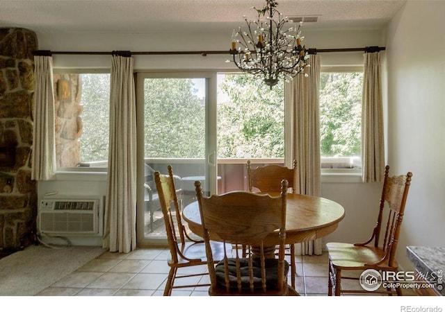 3345 Chisholm Trl Unit 206, Boulder, CO 80301 - dining space featuring a chandelier and light tile patterned floors