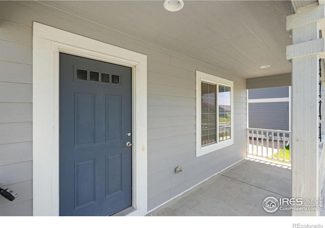 4216 Yellowbells Dr, Evans, CO 80620 - doorway to property with a porch