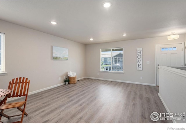 4216 Yellowbells Dr, Evans, CO 80620 - foyer featuring light wood-type flooring and recessed lighting