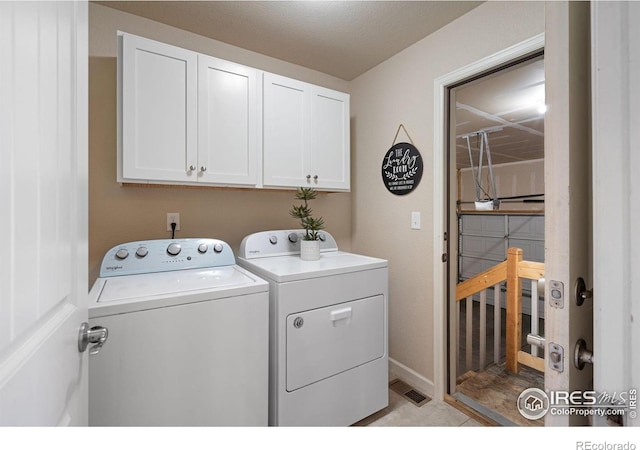 4216 Yellowbells Dr, Evans, CO 80620 - laundry room with independent washer and dryer and cabinet space