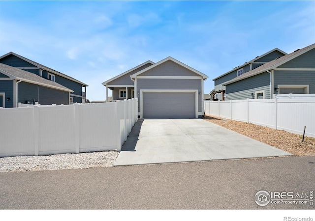 4216 Yellowbells Dr, Evans, CO 80620 - view of front of home with a garage and driveway