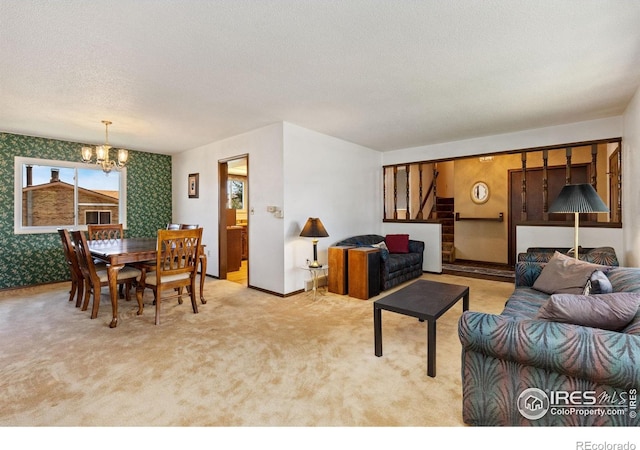 610 S Broadway Ave, Fort Lupton, CO 80621 - living room with a chandelier, light colored carpet, a textured ceiling, and wallpapered walls