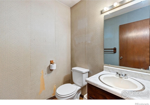 610 S Broadway Ave, Fort Lupton, CO 80621 - bathroom featuring vanity and toilet