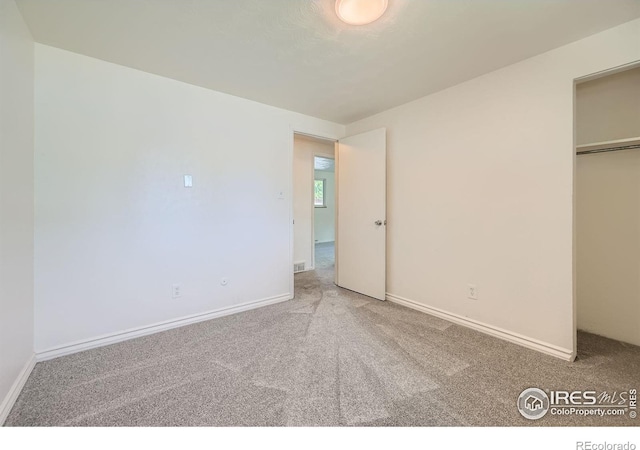 131 E 15th Ave, Longmont, CO 80504 - unfurnished bedroom with carpet and a closet