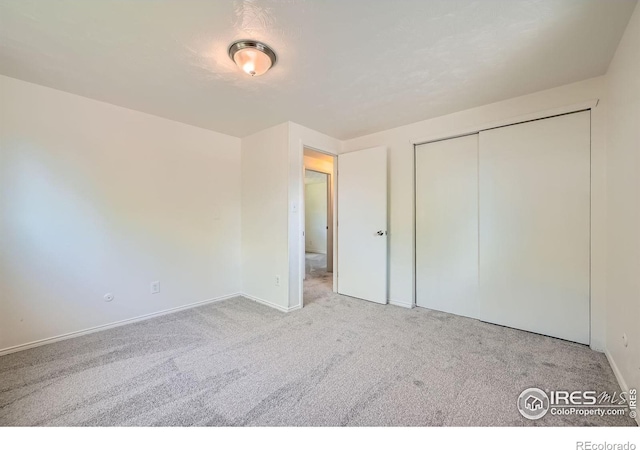 131 E 15th Ave, Longmont, CO 80504 - unfurnished bedroom with carpet and a closet