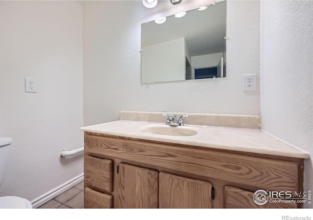 131 E 15th Ave, Longmont, CO 80504 - bathroom featuring vanity and tile patterned flooring