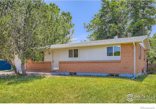 131 E 15th Ave, Longmont, CO 80504 - single story home featuring brick siding and a front yard