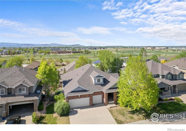 1513 Cannon Mountain Dr, Longmont, CO 80503 - aerial perspective of suburban area featuring a mountainous background