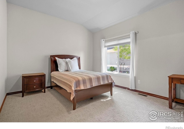 1513 Cannon Mountain Dr, Longmont, CO 80503 - bedroom with lofted ceiling and carpet flooring