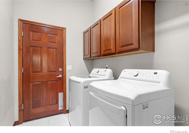 1513 Cannon Mountain Dr, Longmont, CO 80503 - laundry area with cabinet space and washer and dryer