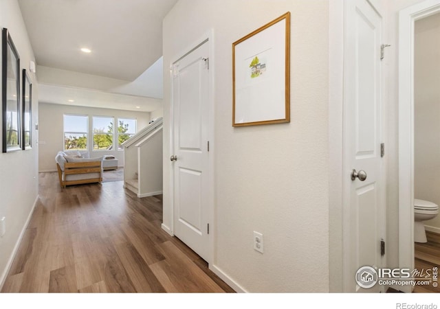3775 Ginkgo St, Wellington, CO 80549 - corridor featuring wood finished floors and recessed lighting