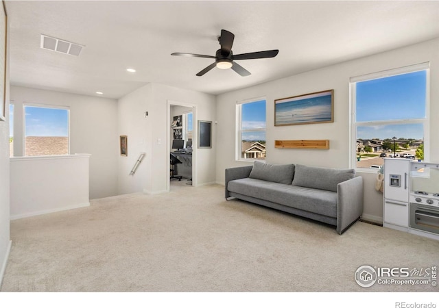 3775 Ginkgo St, Wellington, CO 80549 - carpeted living area with a ceiling fan and recessed lighting