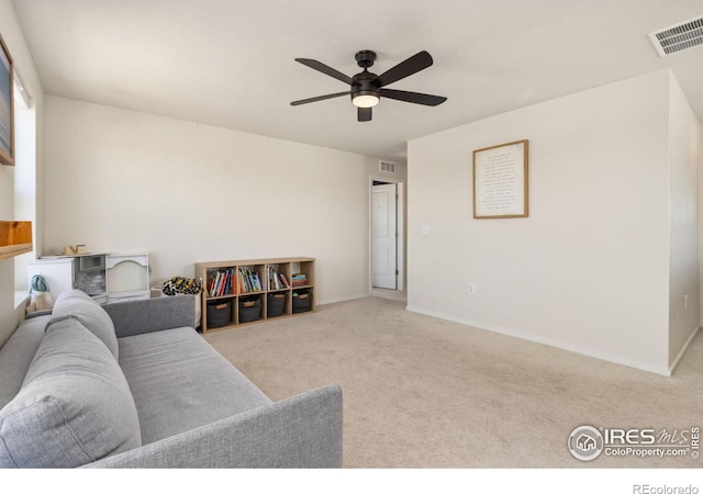 3775 Ginkgo St, Wellington, CO 80549 - carpeted living room with ceiling fan and baseboards