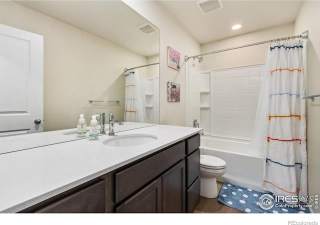 3775 Ginkgo St, Wellington, CO 80549 - bathroom with vanity, shower / tub combo, wood finished floors, and recessed lighting