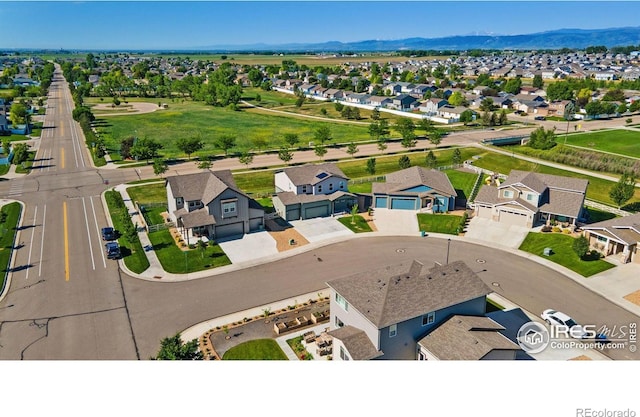 3775 Ginkgo St, Wellington, CO 80549 - aerial view of residential area with mountains