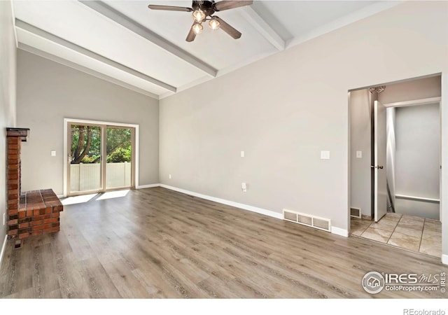 3012 Anchor Way Unit 3, Fort Collins, CO 80525 - unfurnished living room with a ceiling fan, beamed ceiling, wood finished floors, and high vaulted ceiling