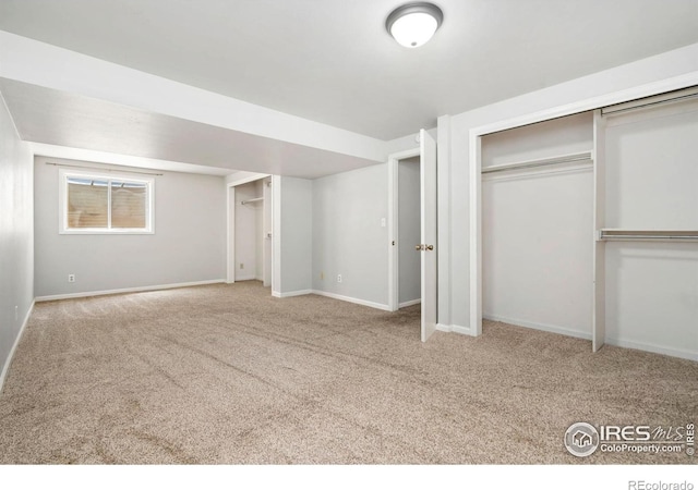3012 Anchor Way Unit 3, Fort Collins, CO 80525 - unfurnished bedroom with carpet floors and two closets