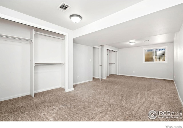 3012 Anchor Way Unit 3, Fort Collins, CO 80525 - unfurnished bedroom featuring carpet and multiple closets