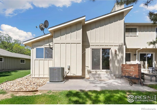 3012 Anchor Way Unit 3, Fort Collins, CO 80525 - back of house featuring board and batten siding, a patio, and entry steps