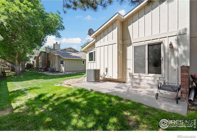3012 Anchor Way Unit 3, Fort Collins, CO 80525 - view of green lawn with a patio area