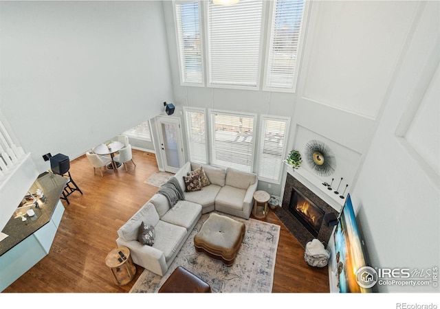 8356 Louden Circle Ft, Collins, CO 80528 - living room with a glass covered fireplace and wood finished floors