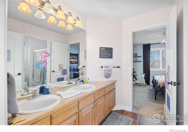 8356 Louden Circle Ft, Collins, CO 80528 - ensuite bathroom featuring double vanity and a chandelier