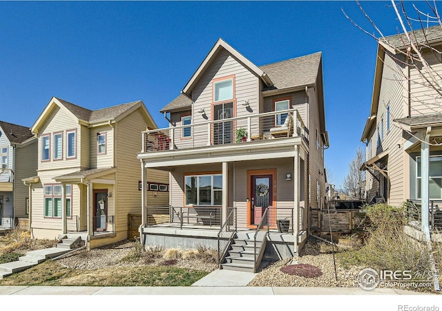 1419 W 67th Ave, Denver, CO 80221 - view of property with a balcony and a porch