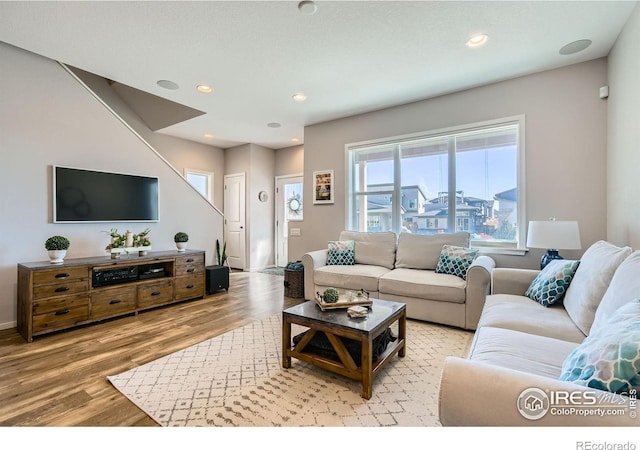 1419 W 67th Ave, Denver, CO 80221 - living room with wood finished floors and recessed lighting