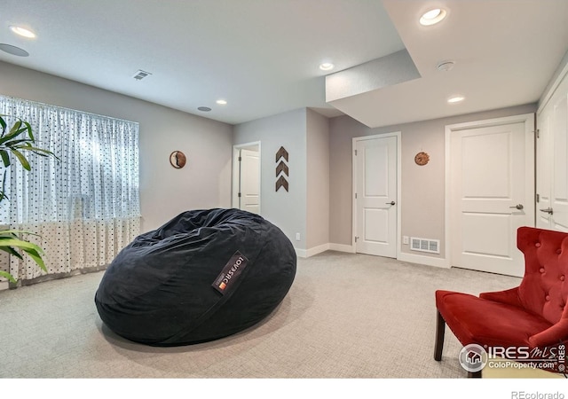 1419 W 67th Ave, Denver, CO 80221 - living area featuring light carpet and recessed lighting