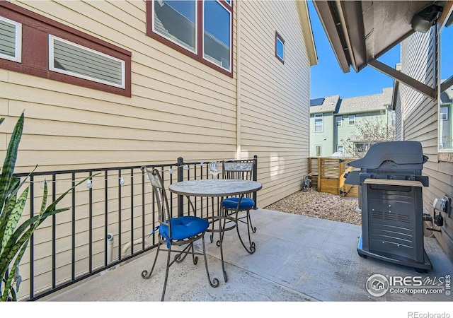 1419 W 67th Ave, Denver, CO 80221 - view of patio featuring grilling area and outdoor dining space