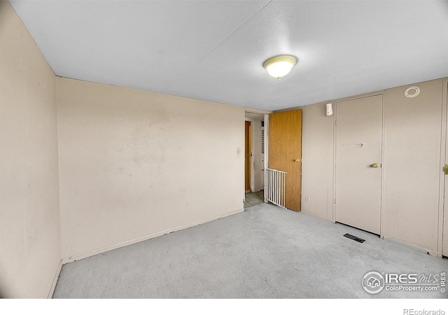 18247 County Road 22, Fort Lupton, CO 80621 - unfurnished bedroom featuring carpet floors and baseboards