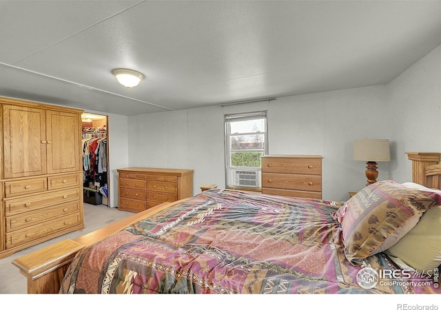 18247 County Road 22, Fort Lupton, CO 80621 - bedroom with cooling unit, a spacious closet, light colored carpet, and a closet