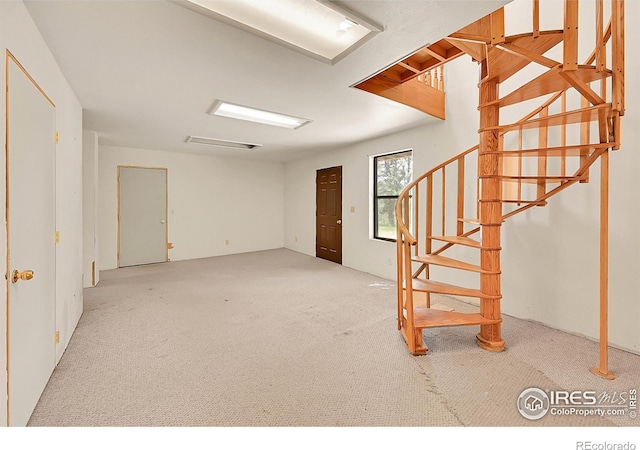 56 Bounty Hunter Ln, Bailey, CO 80421 - below grade area featuring carpet floors and stairs
