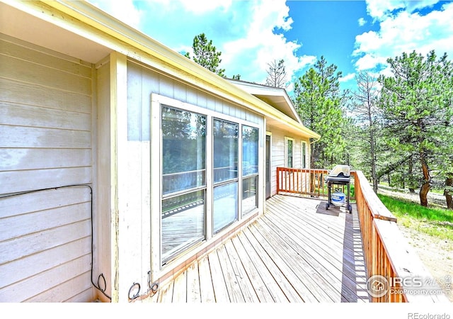 56 Bounty Hunter Ln, Bailey, CO 80421 - wooden deck with a grill