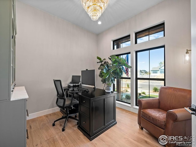 1255 Eliza Ave, Berthoud, CO 80513 - home office featuring a chandelier, light wood finished floors, and recessed lighting