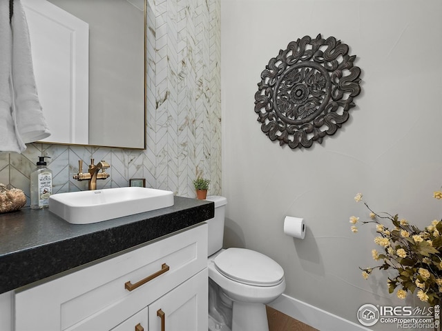 1255 Eliza Ave, Berthoud, CO 80513 - half bathroom featuring tasteful backsplash and vanity