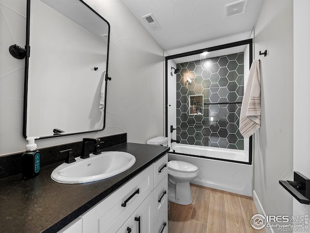 1255 Eliza Ave, Berthoud, CO 80513 - bathroom with vanity, wood finished floors, and shower / bath combination